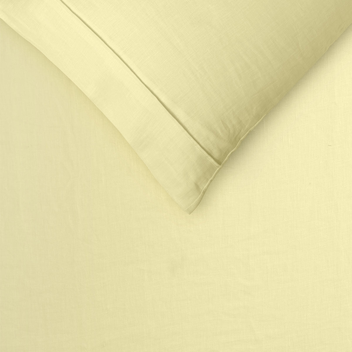 Zoomed-in view of the King Size Butter Yellow Linen's luxurious texture, highlighting the fabric's natural charm.